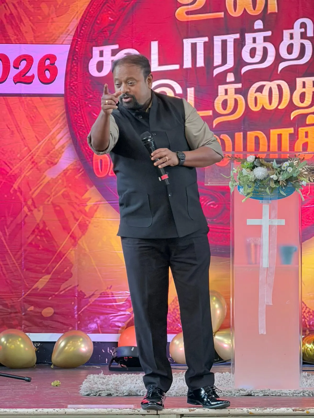 Guest speaker preaching at the Church of Grace anniversary service